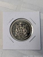 Full view of 1968 Canada 50-cent coin in 2×2 flip