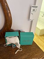 Ring and signature box with pouch displayed