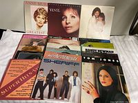 Group shot of majority of LP jackets laid out