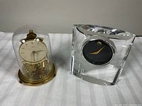 Both clocks side by side showing overall design and scale