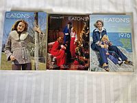 Three Eaton's catalogues laid out