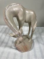 Front left view of deer sculpture