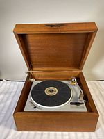 Turntable in wooden case with lid open