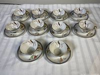All 10 teacup and saucer sets arranged
