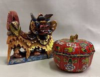Barong sculpture and cloisonné apple box front view
