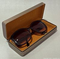 Sunglasses in Bulgari case showing presentation and logo