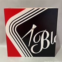 Front view showing graphic design and hands