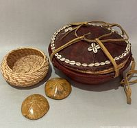 Agelgel basket, woven bowl, two gourd shells grouped