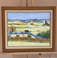 Front view of framed painting showing full artwork and frame