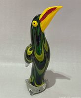 Full view of art glass toucan figurine front left