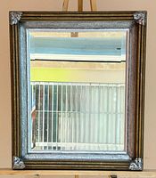 Front view showing full mirror, frame, and bevel