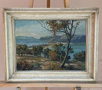 framed painting front view on easel