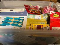 Overview of tote with various packaged items visible