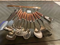 Complete set laid out showing all utensils and hanging rail