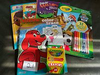 All items in lot: five coloring/activity books, crayon box, and Crayola activity pad