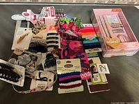 Overview of all packages and loose accessories laid out on table