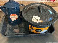Overview of all three enamel pieces: roaster with lid, roasting tray, blue coffee boiler
