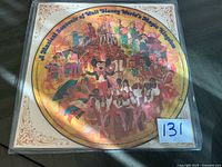 Front view of Disney picture disc LP in sleeve showing full artwork and title