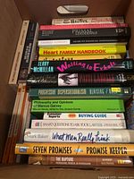 Overview of books stacked in box