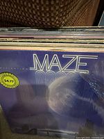 Stack of LPs showing Maze "Inspiration" cover and others behind