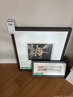 Both framed prints side by side to show relative sizes and frames