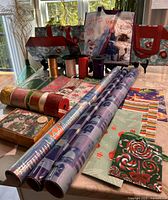 Assorted rolls, ribbons, bags, boxes and sheets displayed