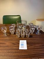 Full set showing ice bucket, 2 stemmed glasses and 12 shot glasses
