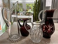 Group shot of all four pitchers on countertop