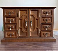 Front view showing overall cabinet and drawer layout