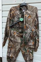 Jacket and pants hanging together showing full set