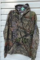 Front view of Cabela's camo hoodie showing pattern, logo and sleeve text