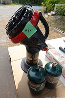 Heater mounted on cylinder with two additional cylinders