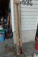 Full view of rebar cutter on wood board