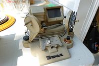 Front view showing full Tower 8mm film editor, reel arms, screen and film gate