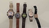 Group image of five vintage wristwatches