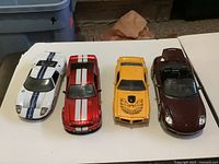 Front top view of all four diecast cars