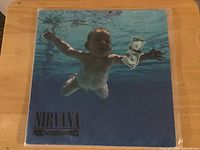 Front jacket with iconic baby underwater artwork