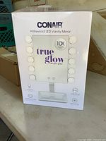 Front of sealed box showing product image and branding