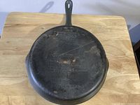 Bottom view showing brand embossing and overall wear