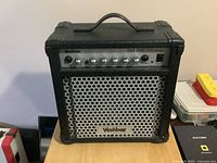 Full view of Washburn Bad Dog amplifier on table