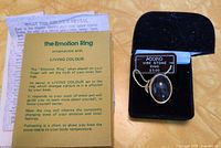 Ring in presentation box with leaflet visible