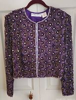 Front view of purple Night Vogue beaded jacket