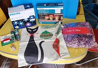 Light sets, cushion cover, garland, scented sticks, bulb tester, matchbox