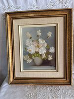 Framed painting front view showing entire artwork and frame