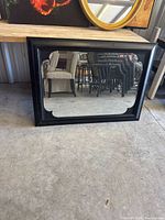 Mirror oriented horizontally showing full frame and glass