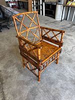 Front angled view of bamboo Chippendale armchair
