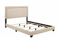 Stock-style photo of assembled beige upholstered king bed frame with headboard and slat system