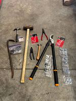 All tools and hardware laid out on floor