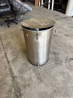 Front view of stainless steel stock pot with lid on