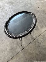 Top view showing glass insert and beaded metal rim